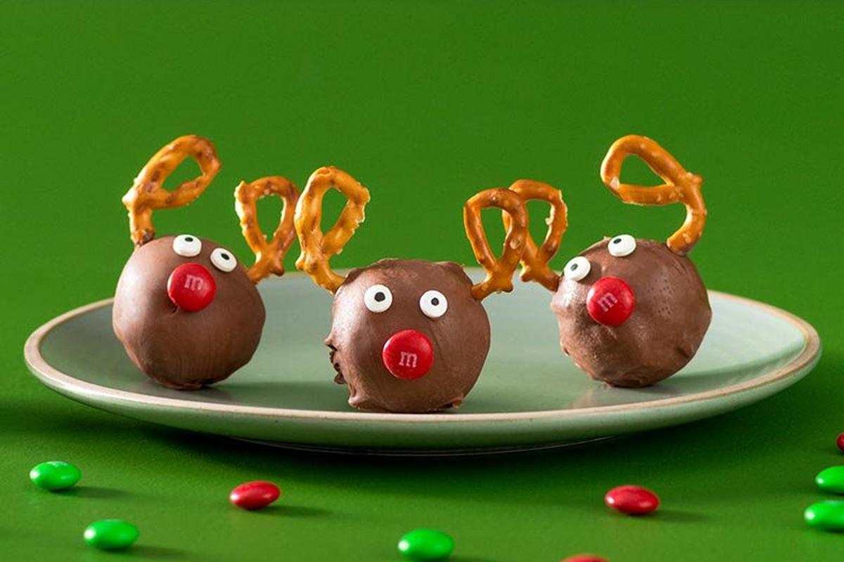 chocolate balls with pretzel antlers