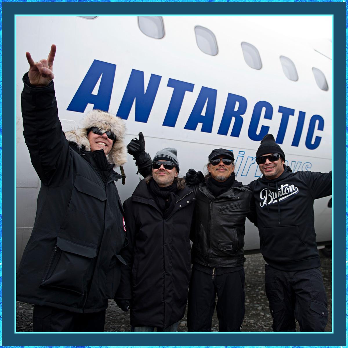 Photo of Metallica Posing with an Airplane