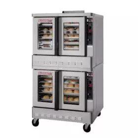 Double stacked convection ovens with visible trays of baked goods inside.