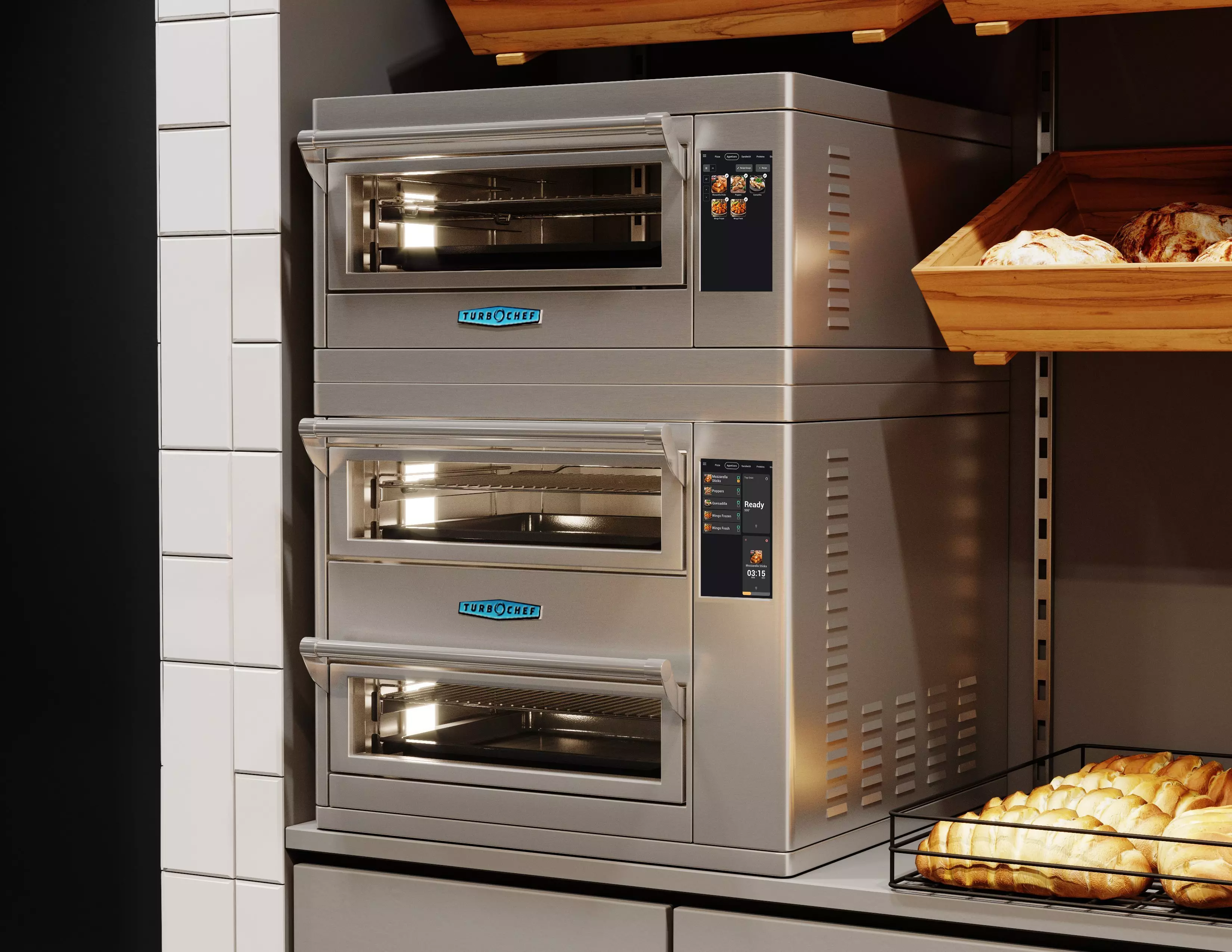 Stacked TurboChef stainless steel countertop ovens with digital touchscreens in a bakery display.