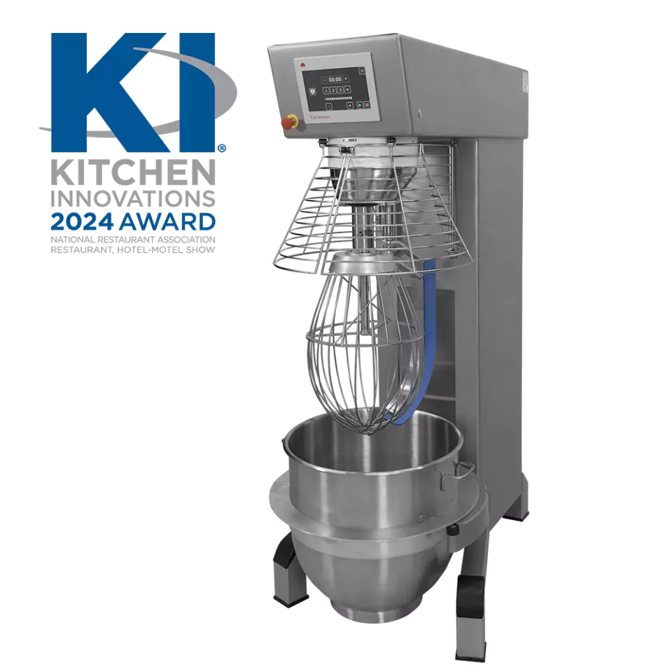 Varimixer commercial stand mixer with stainless steel bowl and whisk attachment.