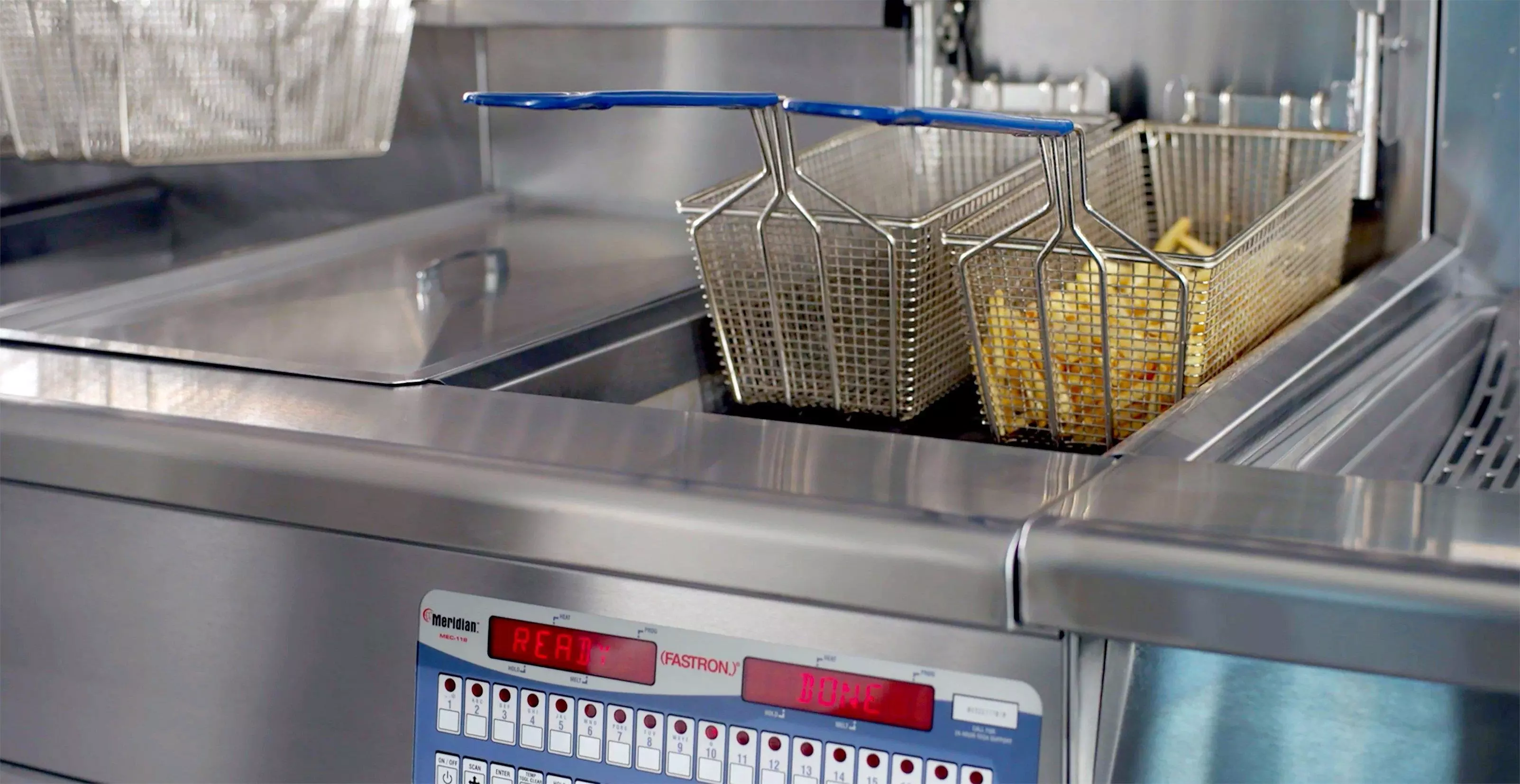 French fries coming out of an Imperial fryer with programmable features