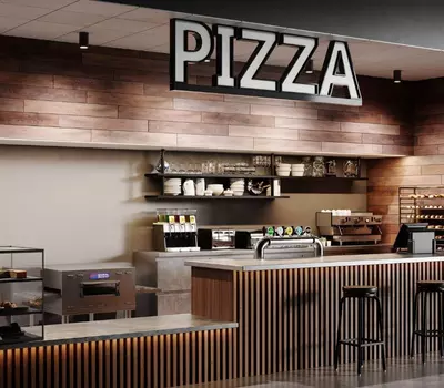 Modern pizza counter with bar stools, coffee machine, and shelves with dishes. Large "PIZZA" sign above.