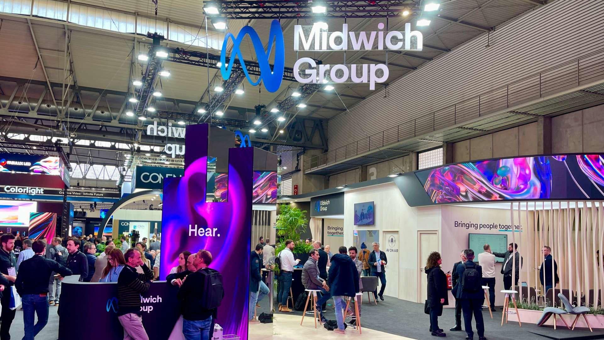 a group of people are standing around a large group of people