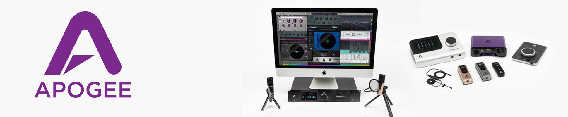 a computer with a monitor and music recording equipment