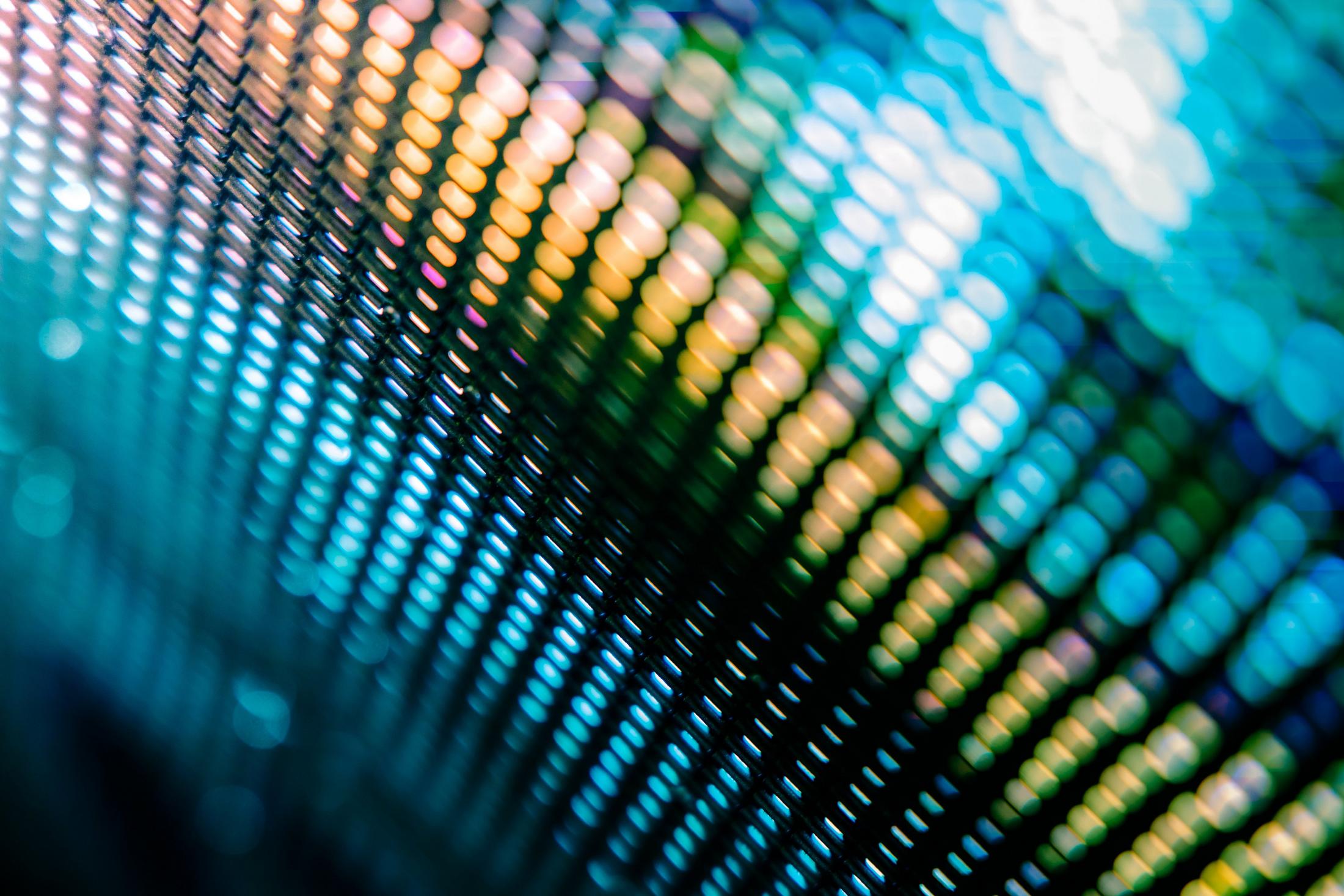 a dark blue background with many pictures of people and business