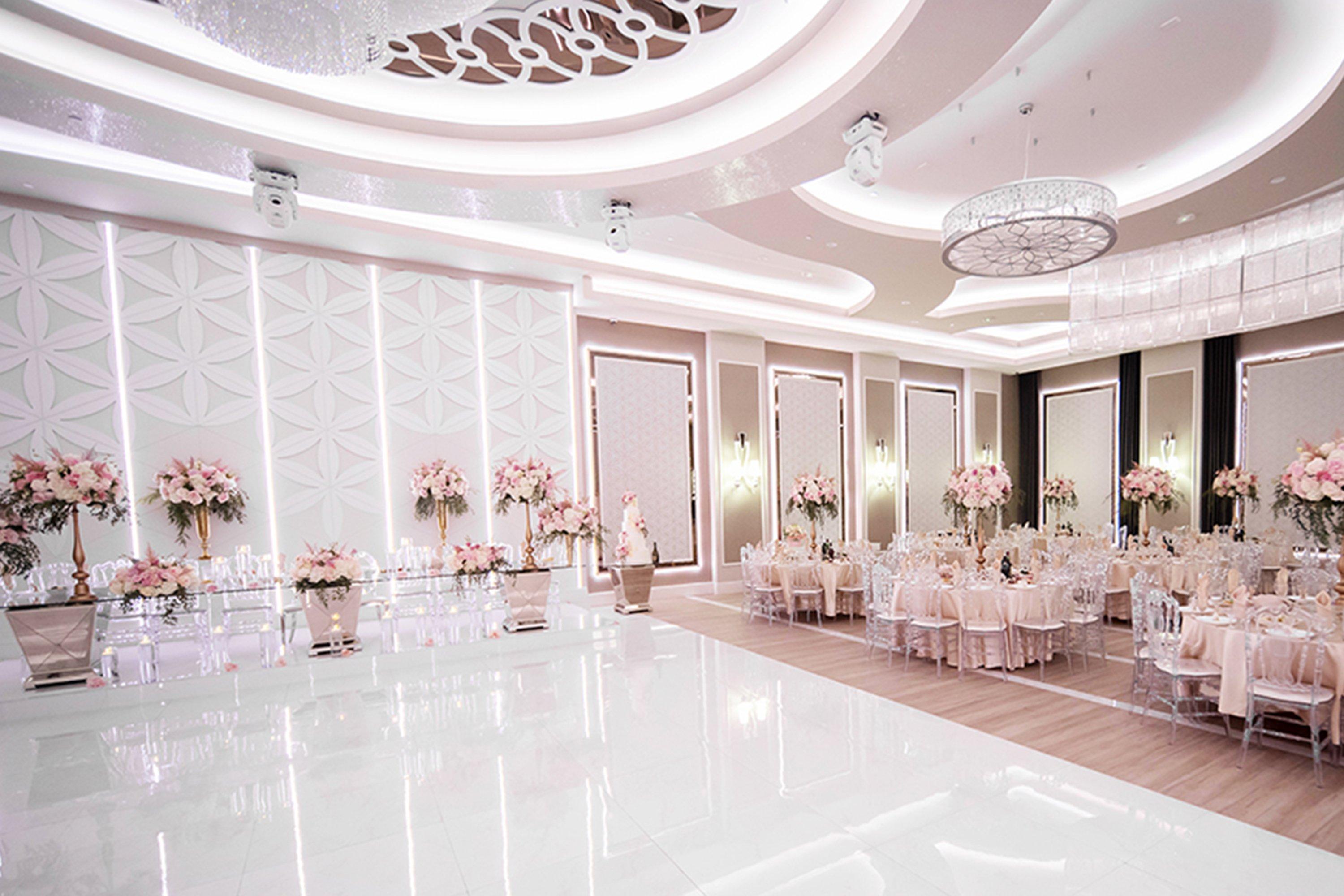 a large room with a large white floor and a large white ceiling