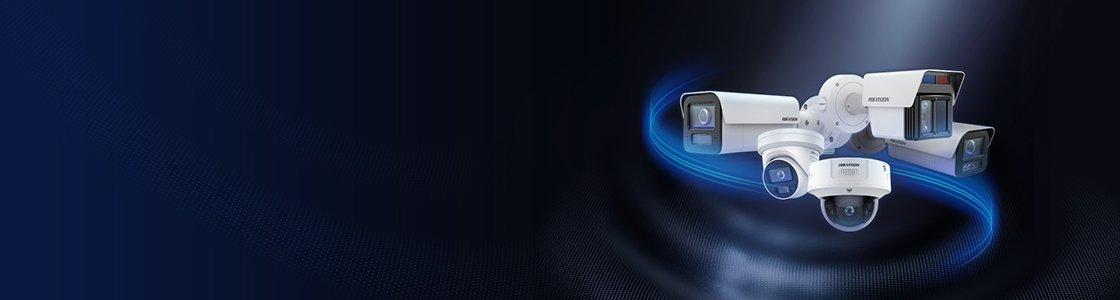 a group of three cameras are shown in a blue background