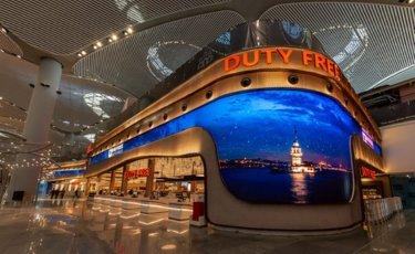 a large building with a large picture of a city on the side of it