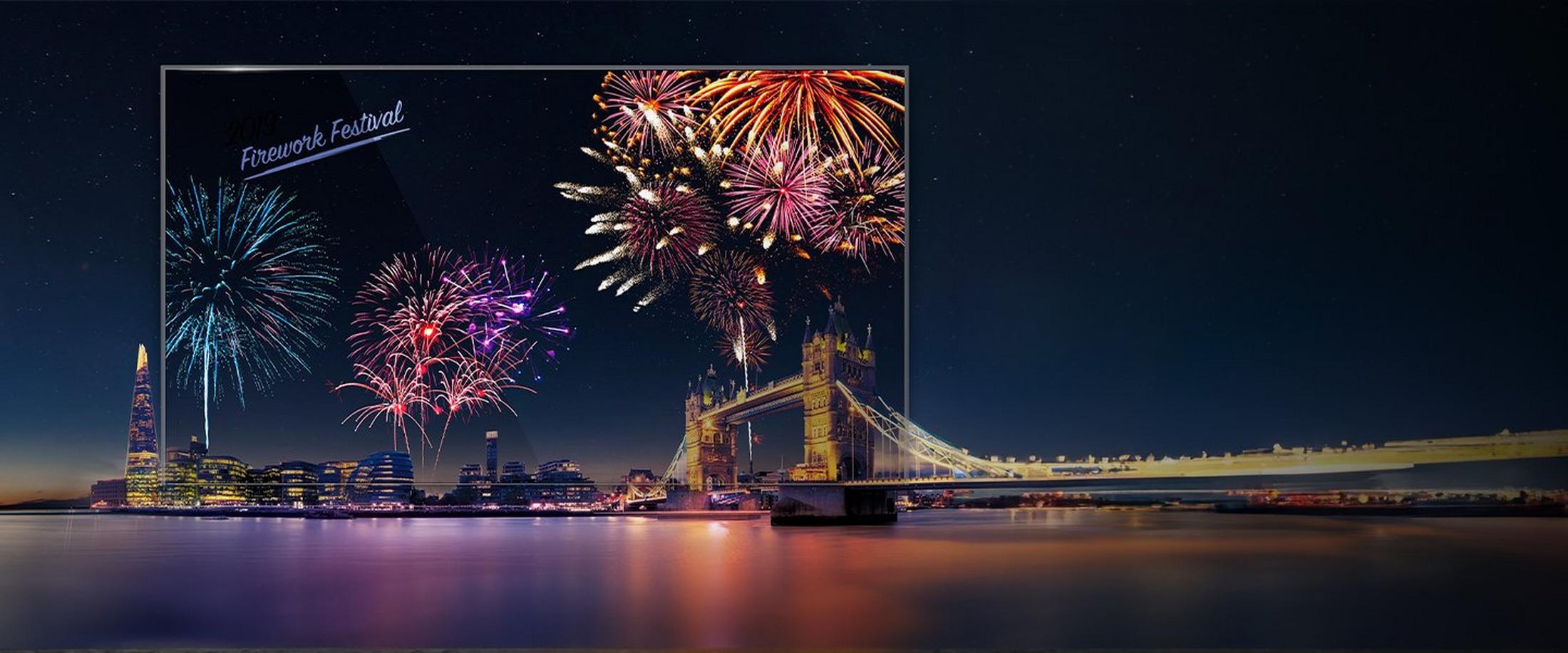 a picture of a picture of fireworks over a bridge