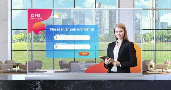 a woman is standing in front of a large screen with a sign that says zz