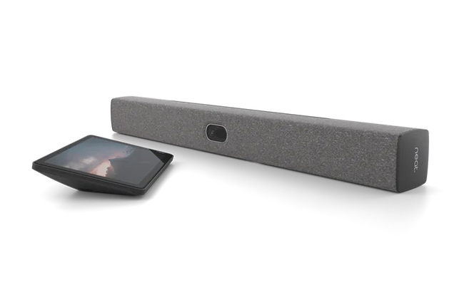 a speaker system with a tablet on top of it