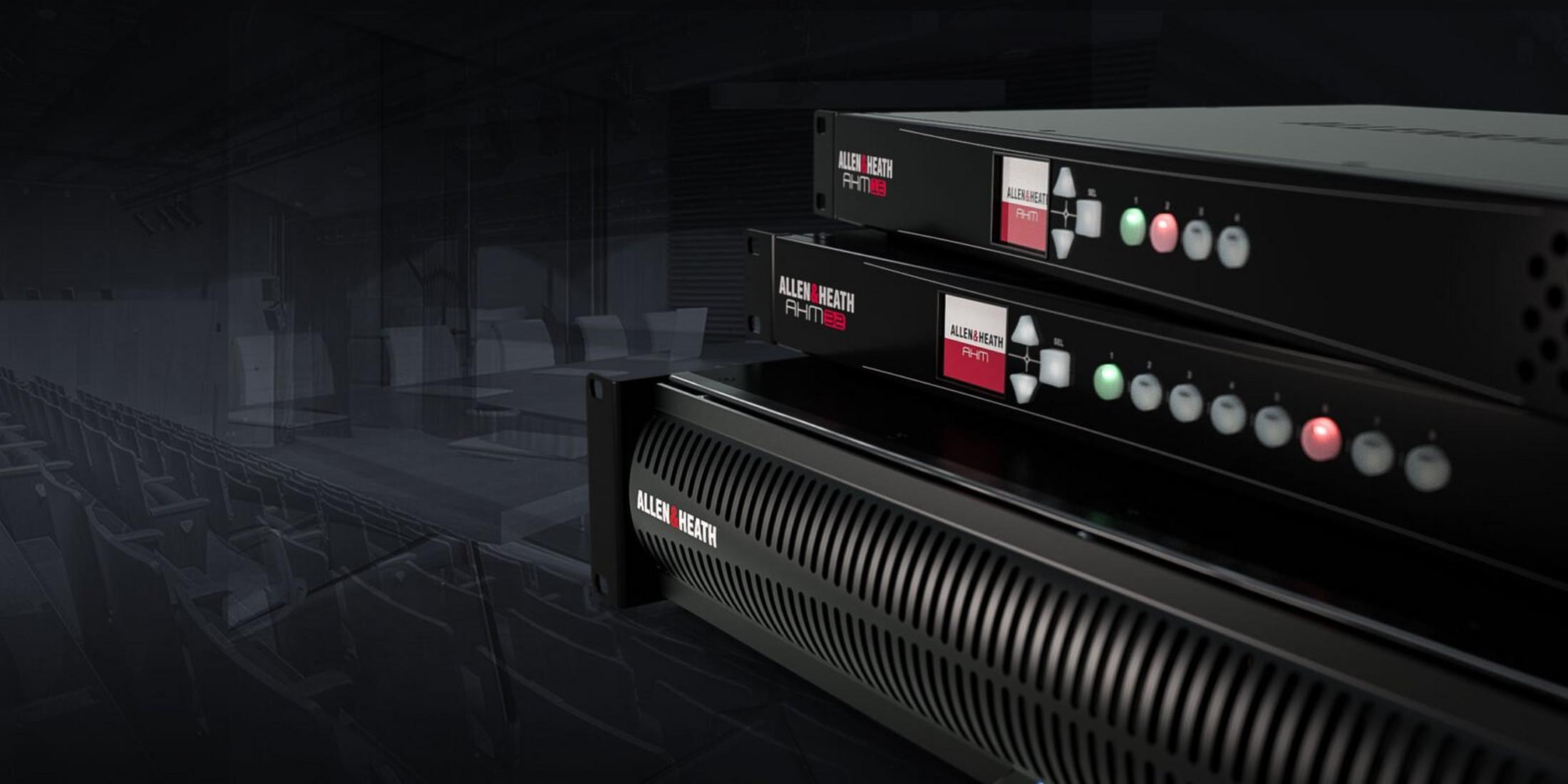 a group of three black boxes sitting on top of each other