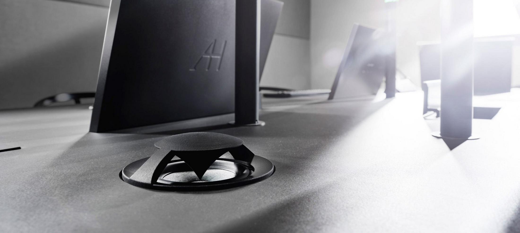 a close up of a computer monitor sitting on a desk