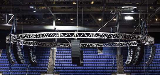 a large stage with a large circular structure in the middle