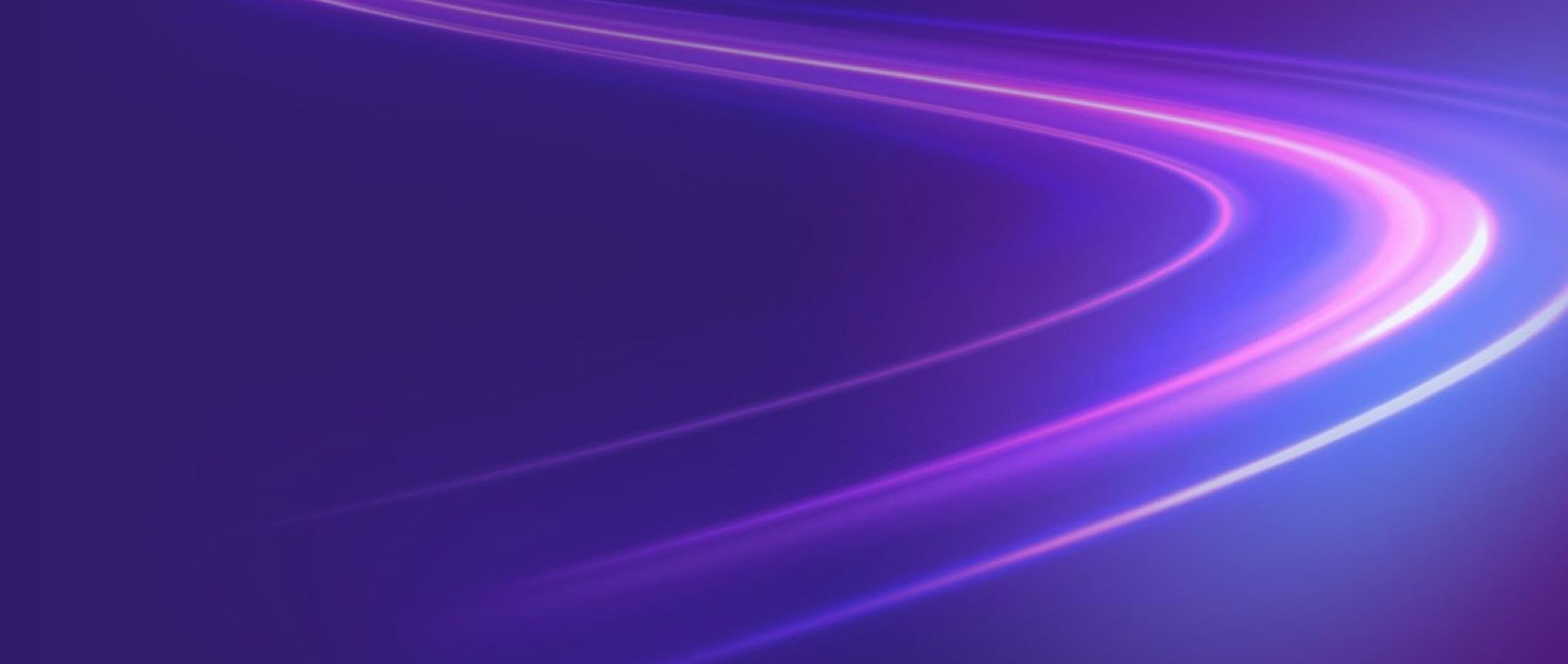 a purple and blue light streaks on a dark background
