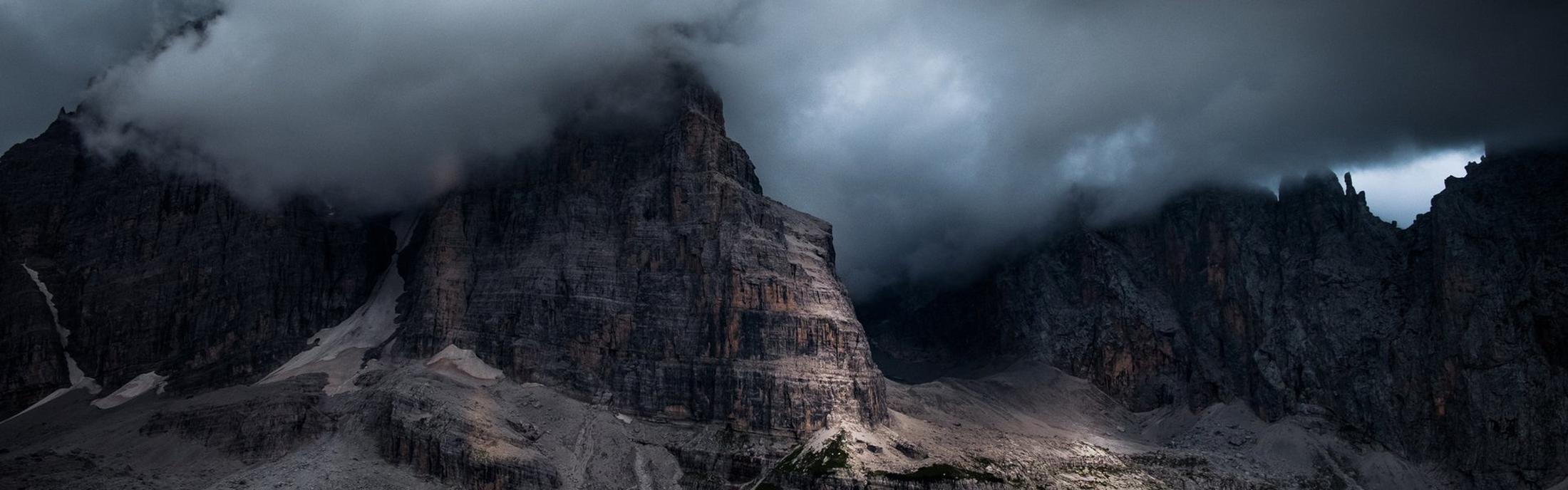 Dark brooding mountains with clouds
