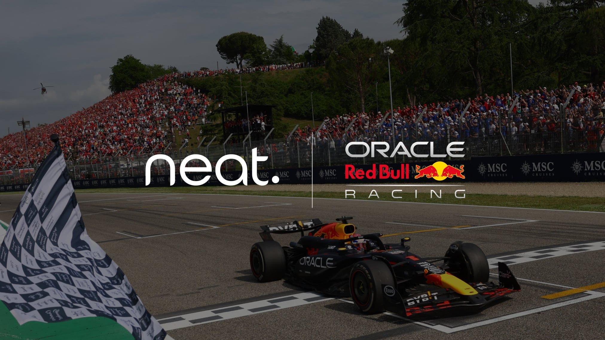 a red bull racing car is driving down a race track