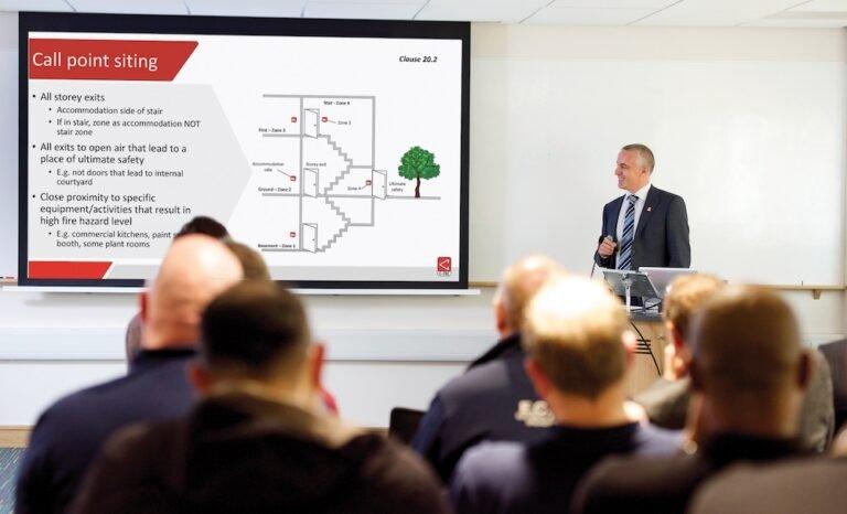 Staff watching a fire training powerpoint