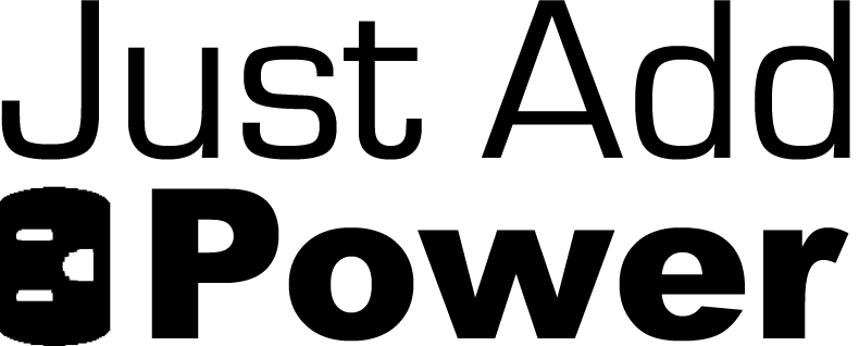 a clock is shown in the dark with a black background