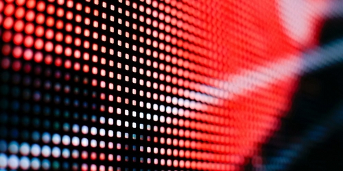 a close up of a red and black screen with a red and black pattern a close up of a red and black screen with a red and black pattern