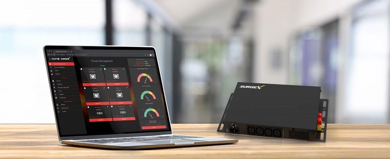 a laptop computer sitting on top of a wooden table