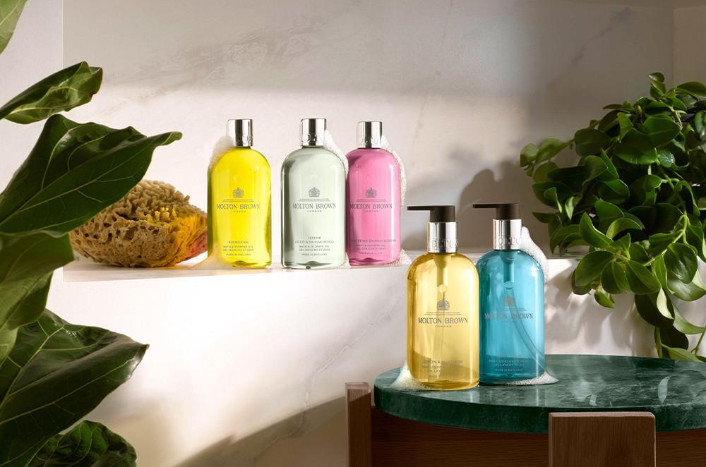 An image of 6 bottles of Molton Brown Bath & Shower Gel & Hand Gel