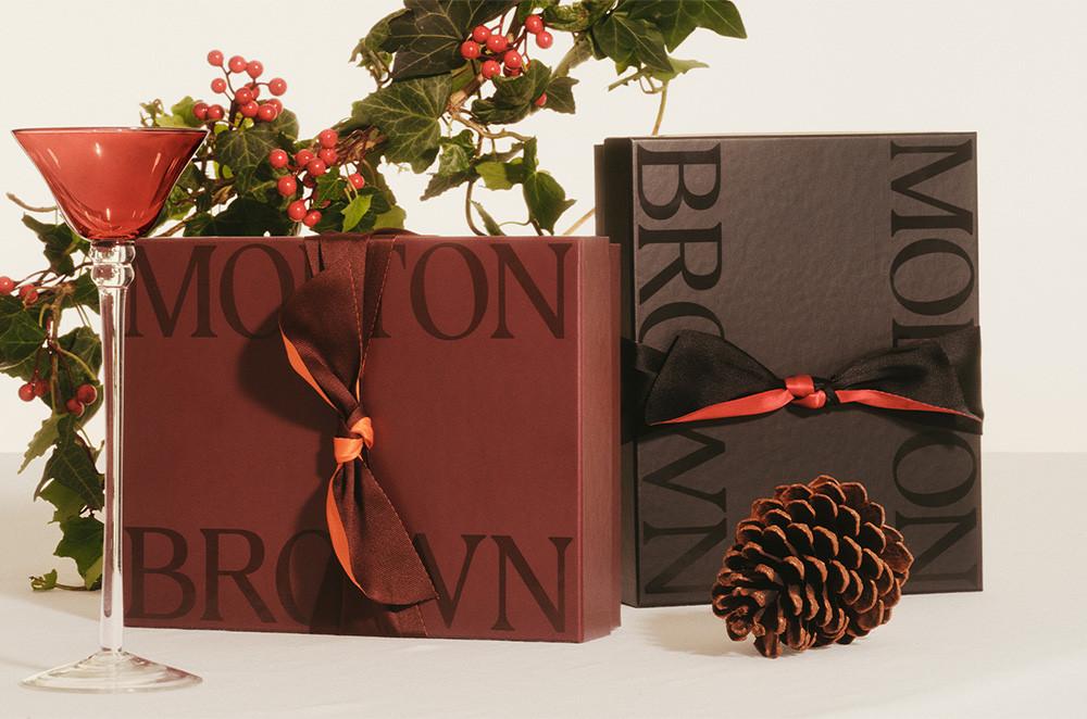 an image of gift boxes and a brown ribbon