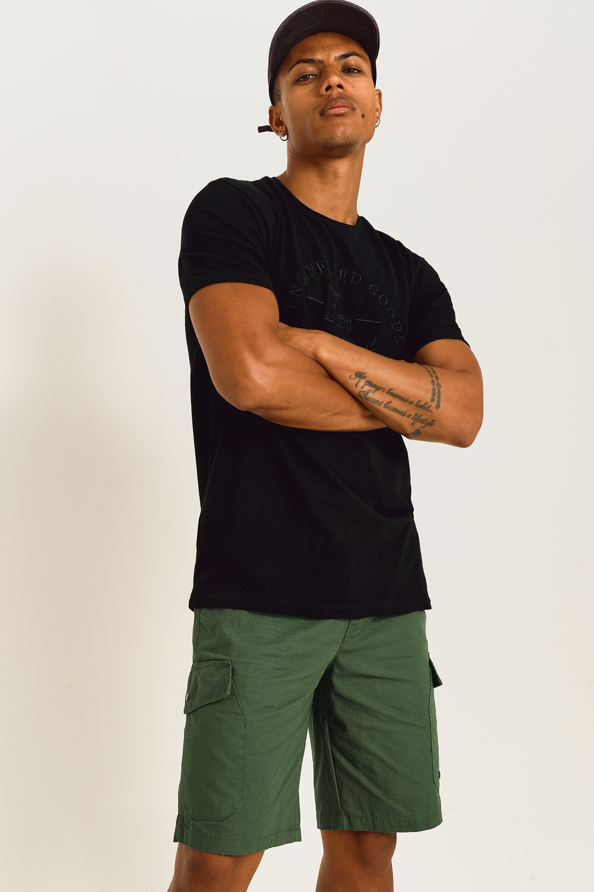 Black shirt green store shorts