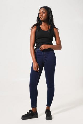 High-waisted dark blue jeggings