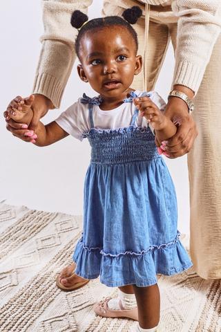 Baby girl wearing store dress