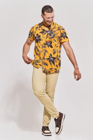 Free Photo  View of hawaiian shirt with pants and sneakers