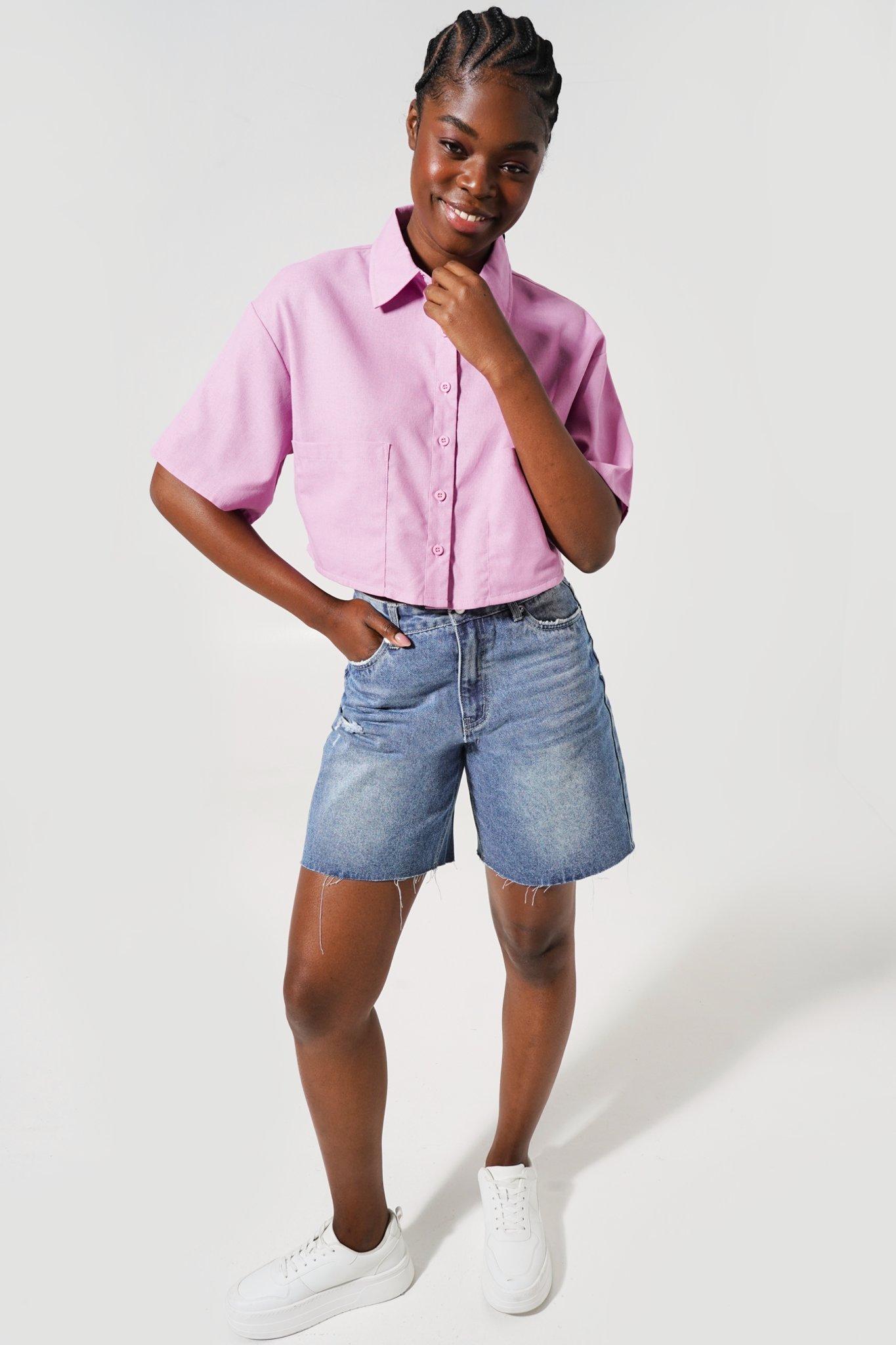 ASOS DESIGN shorter length denim shorts in 90s mid wash with rip