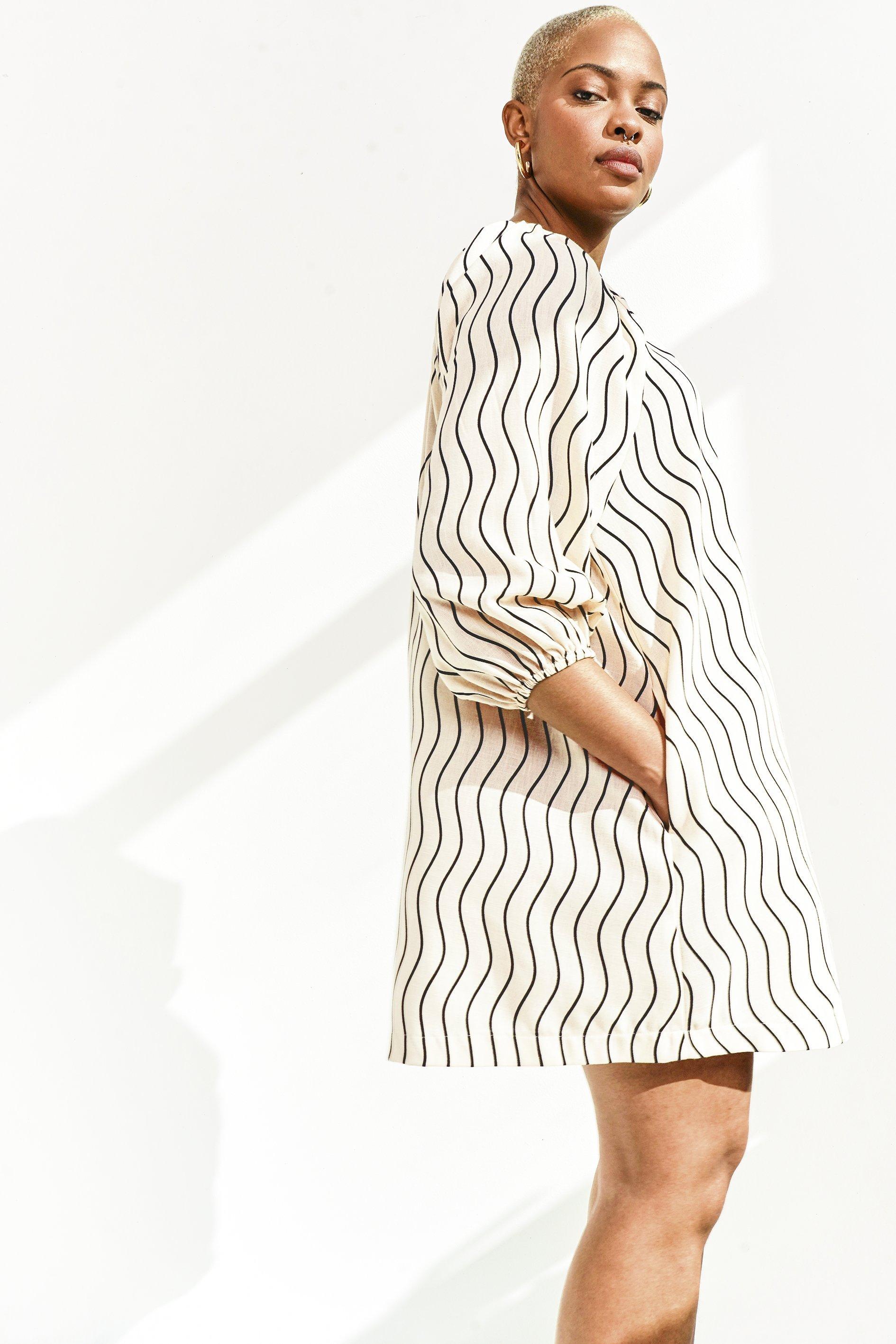 Crawl Motif Embroidered Trapeze Dress