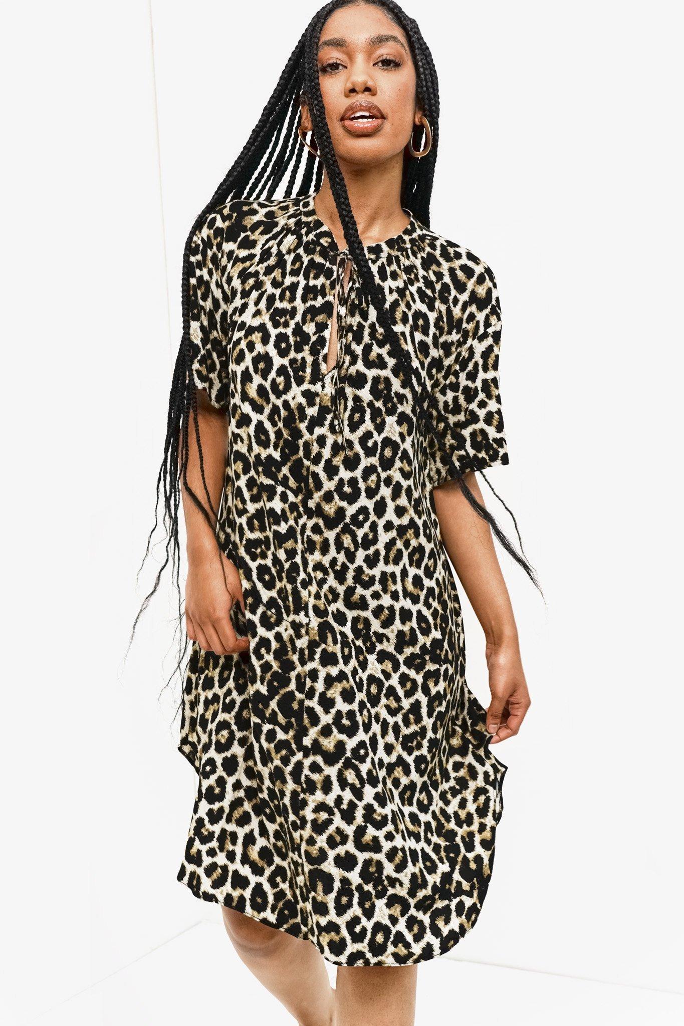 White leopard print dress top