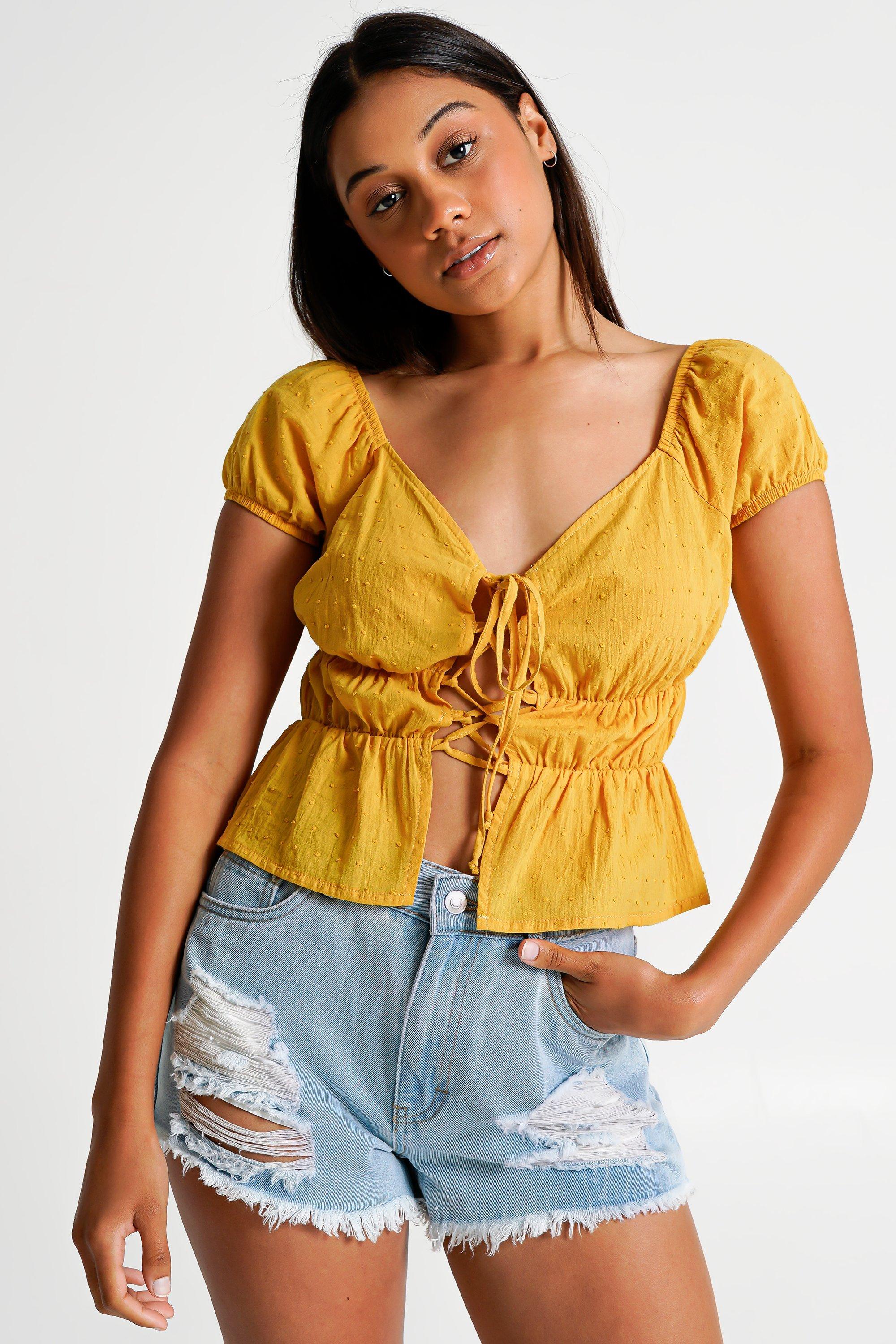 Yellow tops at store mr price