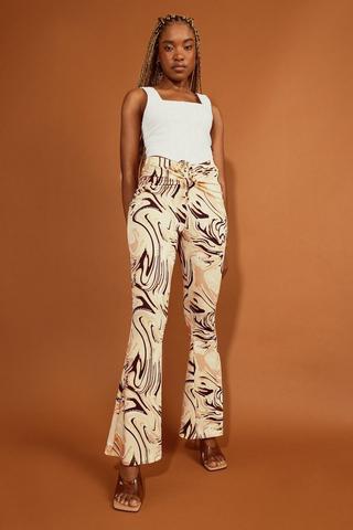 New Look zebra print flare pants in brown pattern