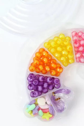 Rainbow Beads In Clam