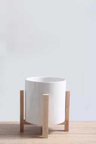 DECORATIVE PLANTER WITH WOODEN LEGS
