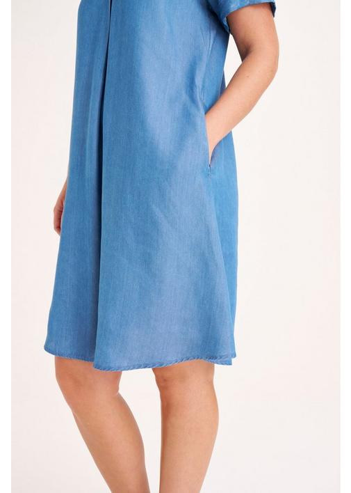 Miladys - Shift into relaxation mode in this soft denim dress with festive  ruffled sleeves. Where are you wearing yours this holiday? View more  Dresses here