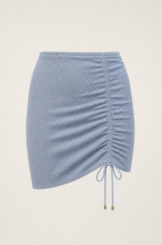 TEXTURED SIDE ROUGE SWIM SKIRT