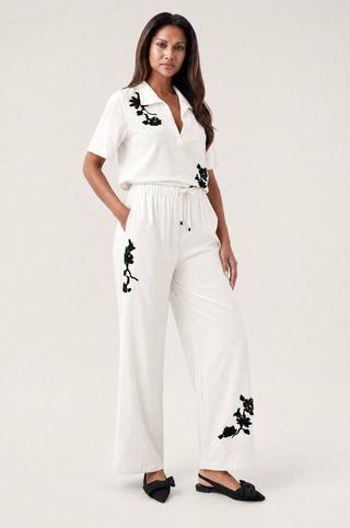 EMBROIDERED HENLEY TOP