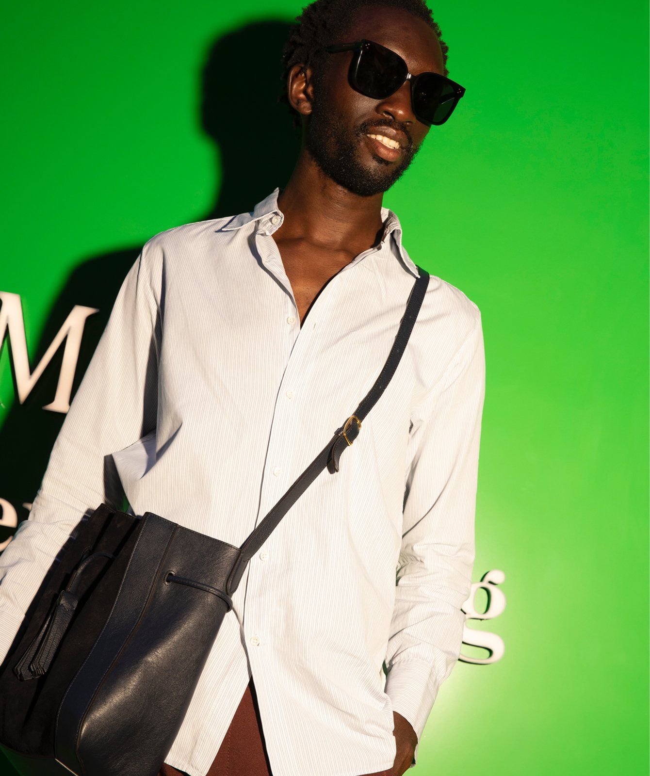 Male model posing during the launch event of the Mulberry x Alexa Chung collection
