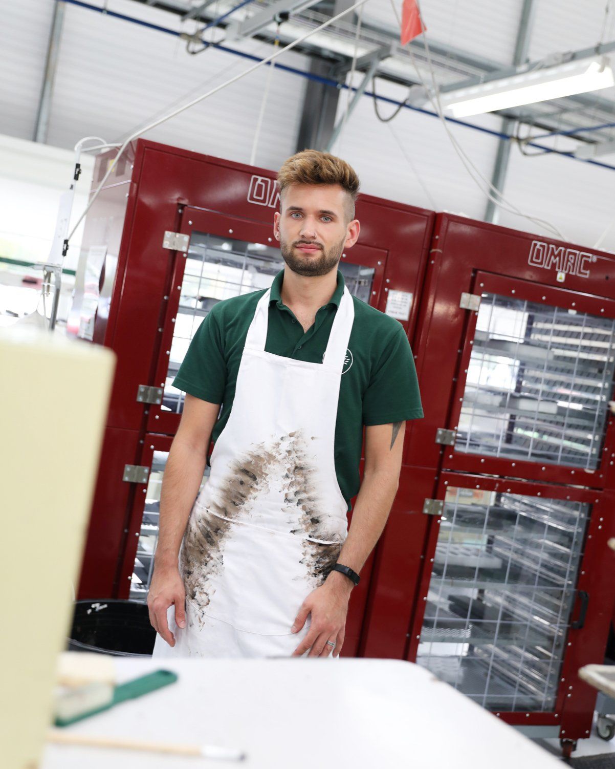 Mulberry employee working as an inker in the factory