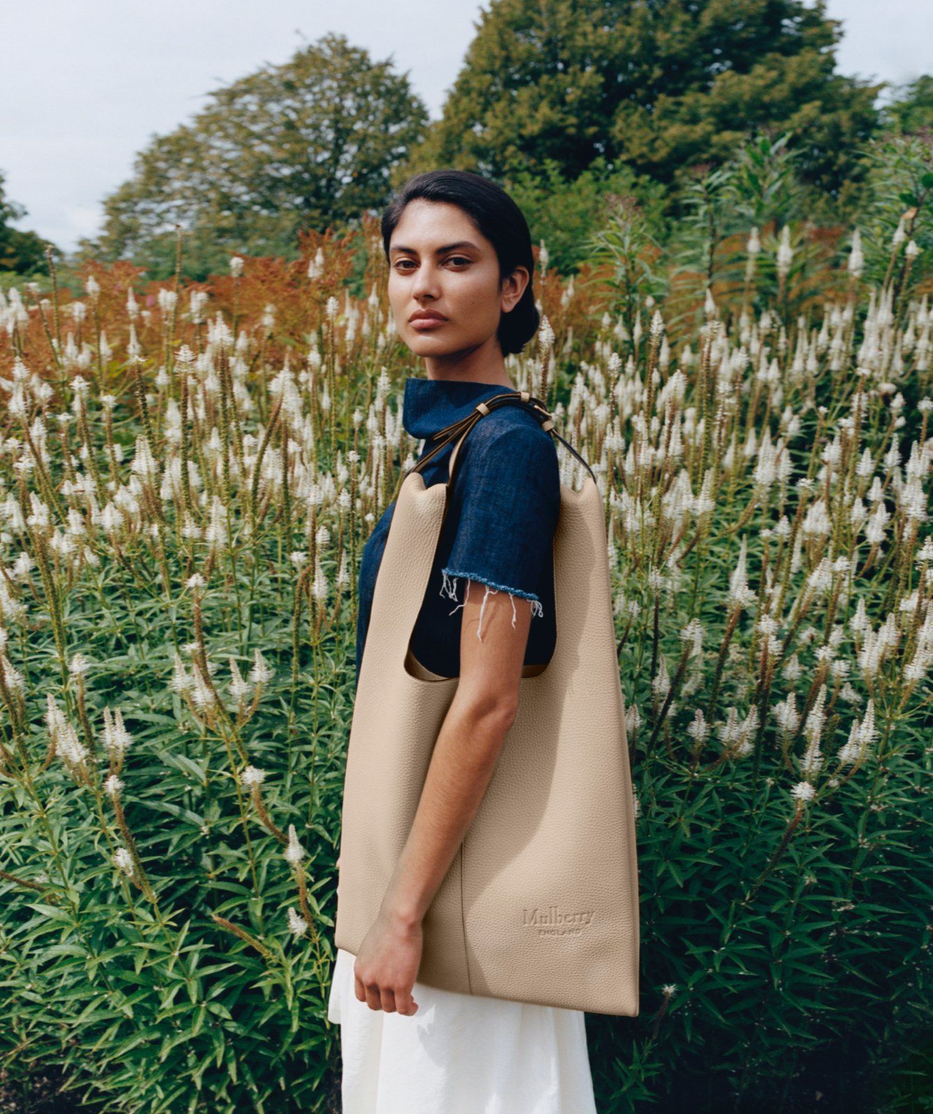 Model wearing Oversized Portobello in Chalk Heavy Grain Leather