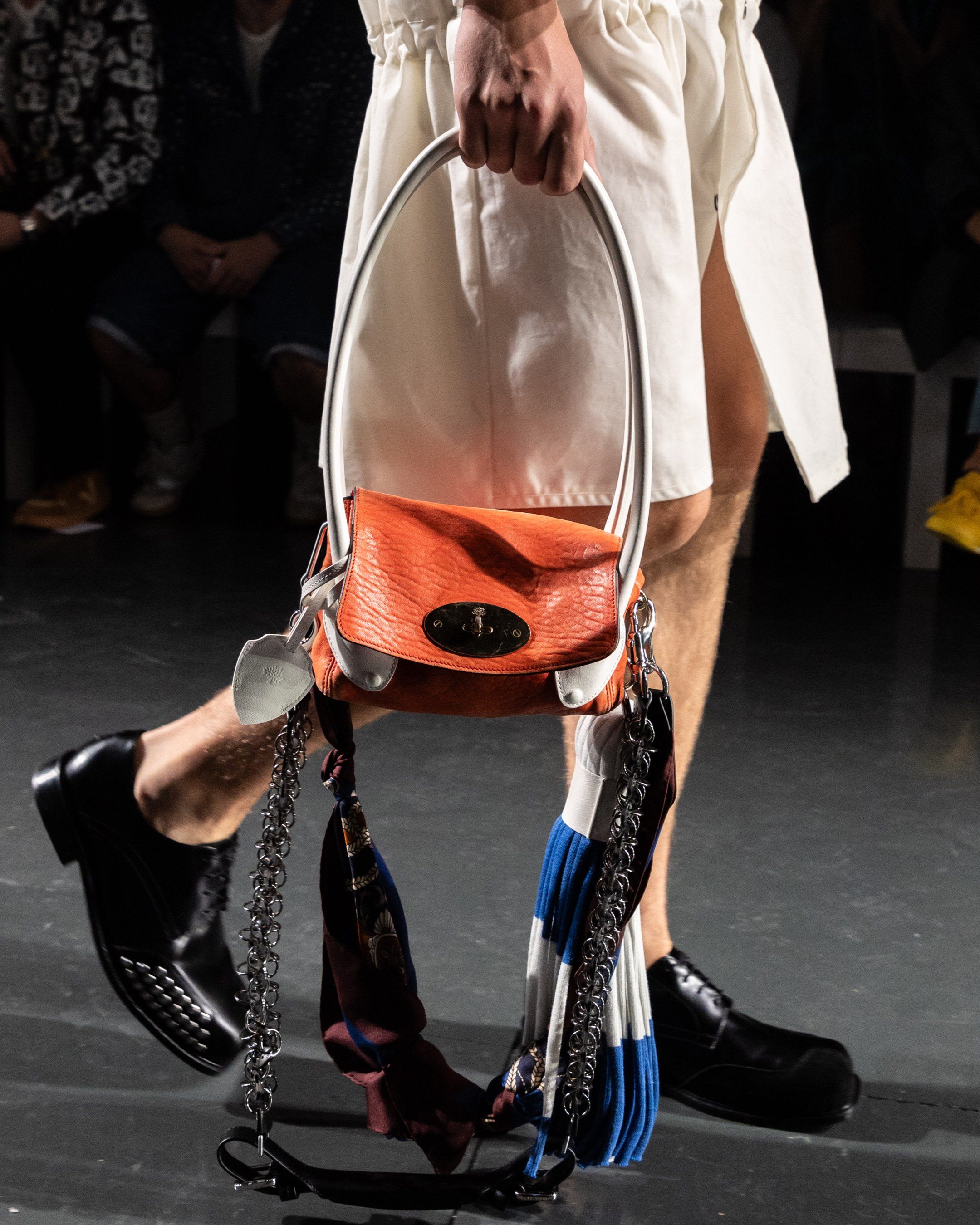 Model holding the Mulberry x Stefan Cooke Edna Swing bag