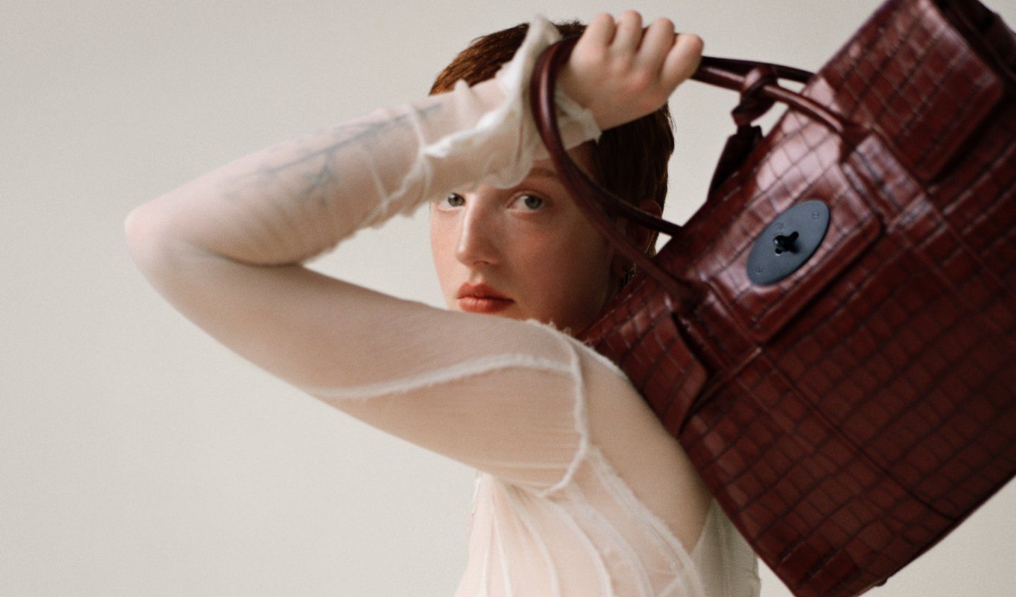 model wearing mulberry Archive Bayswater Vintage Embossed Croc in cognac brown