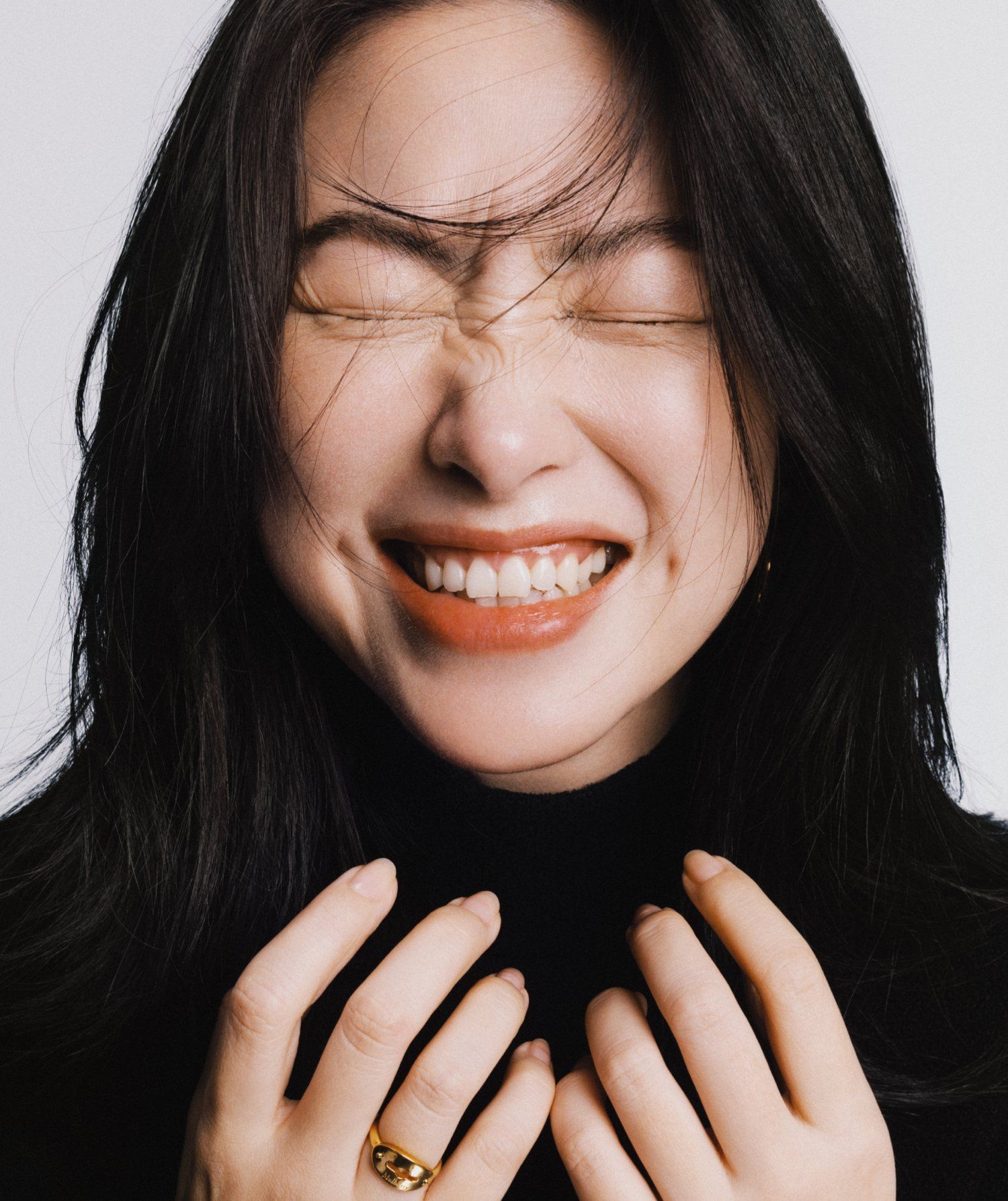 model wearing Bayswater Small Ring in gold