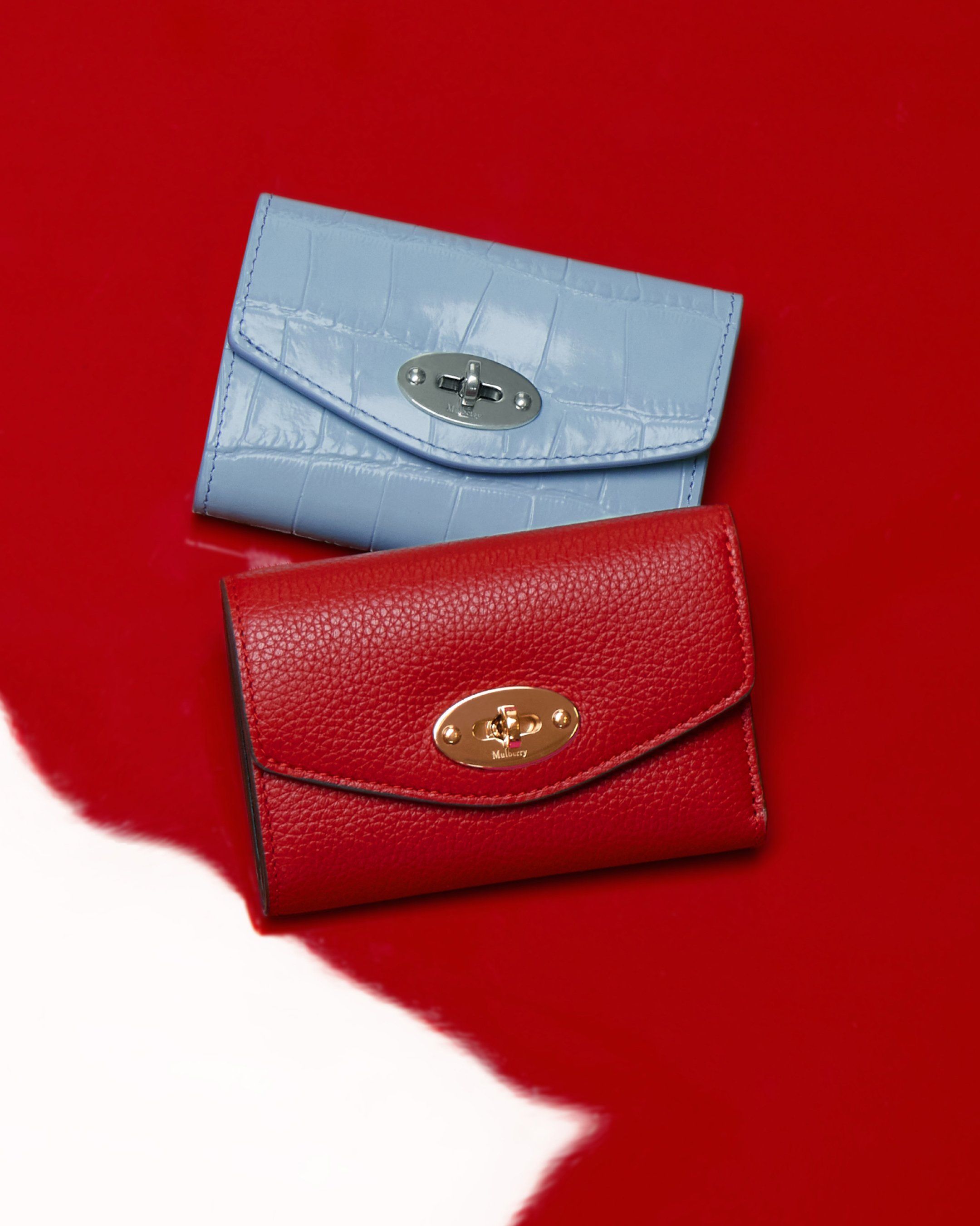 Two Mulberry wallets in red and blue leather