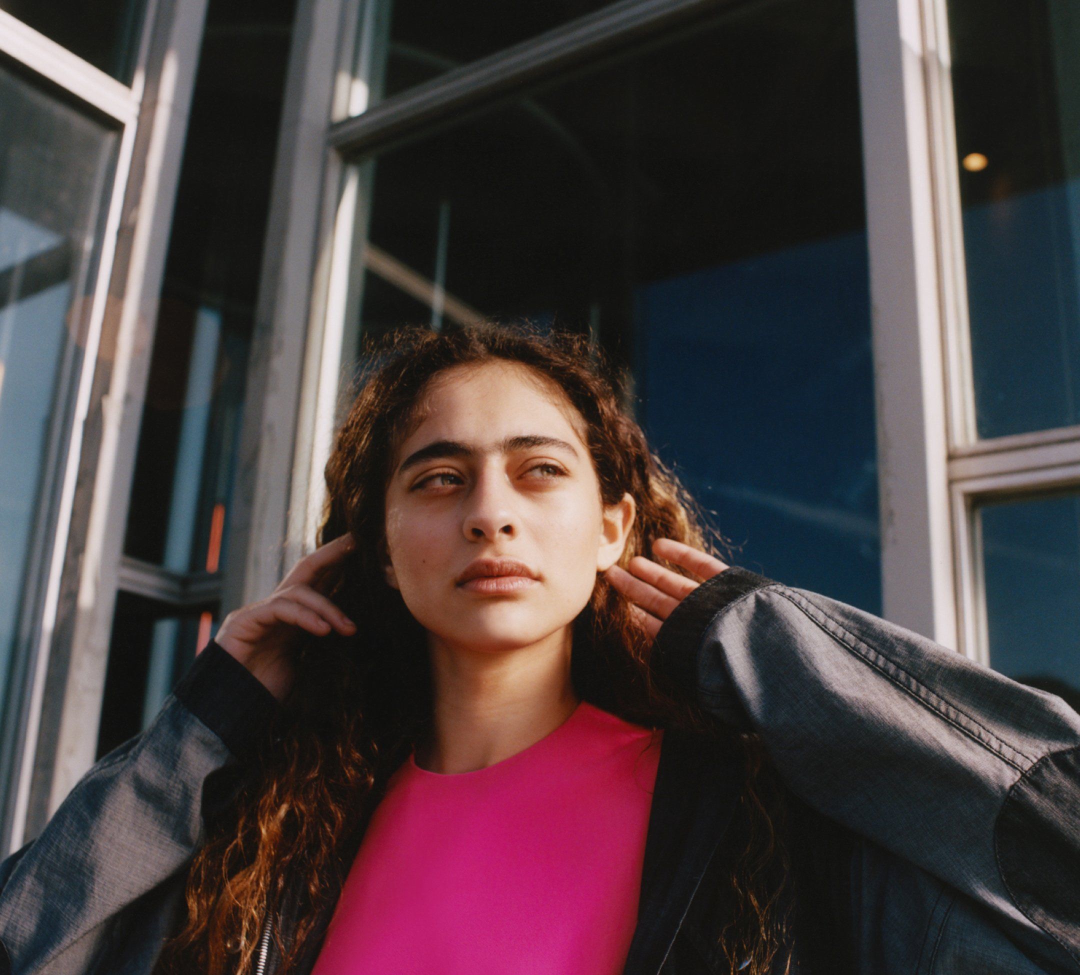 headshot of model Deba Hekmat in city